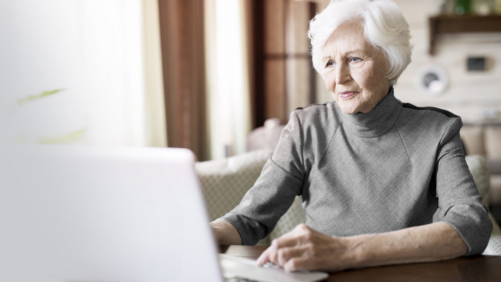 older woman on laptop